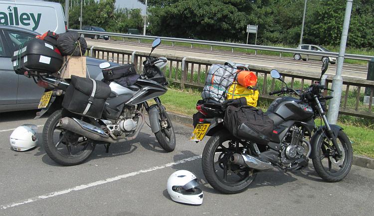 two-125-motorcycles-loaded-and-ready-for-camping.jpg