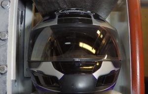 Watch what happens when you put a motorcycle helmet in a hydraulic press