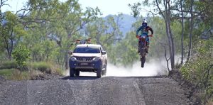 Dirt bike goes head to head with pick-up truck