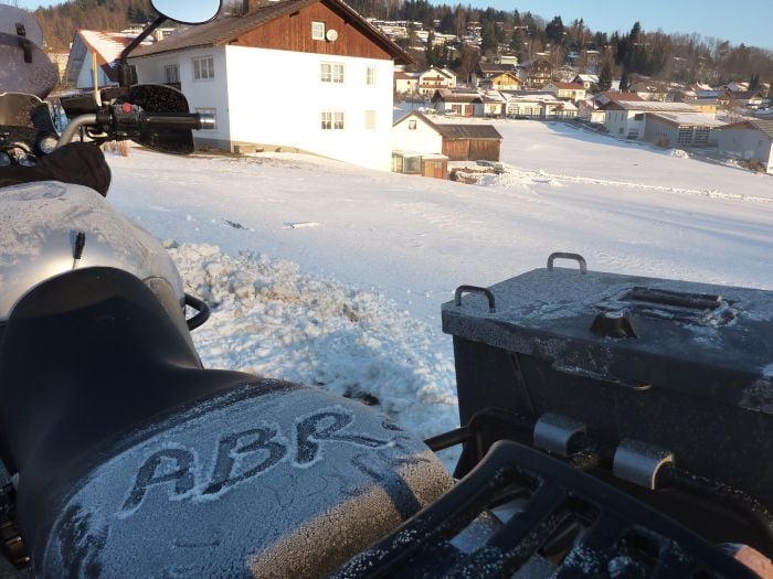 ABR written in the ice on a motorcycle saddle