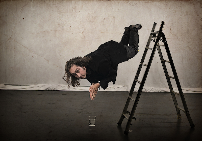 Ross Noble diving off a ladder