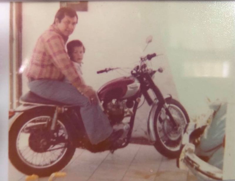 Father and son on motorcycle