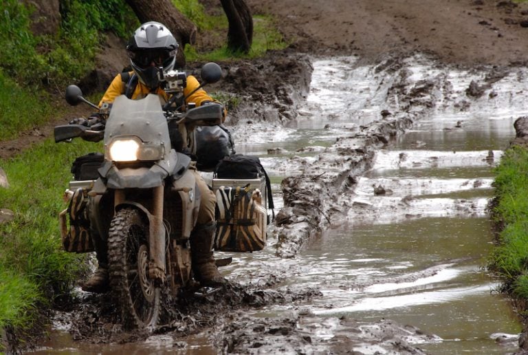 A motorcycle riding in mud