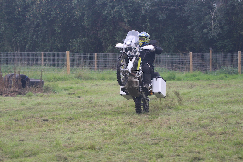 A Husqvarna 701 doing a wheelie