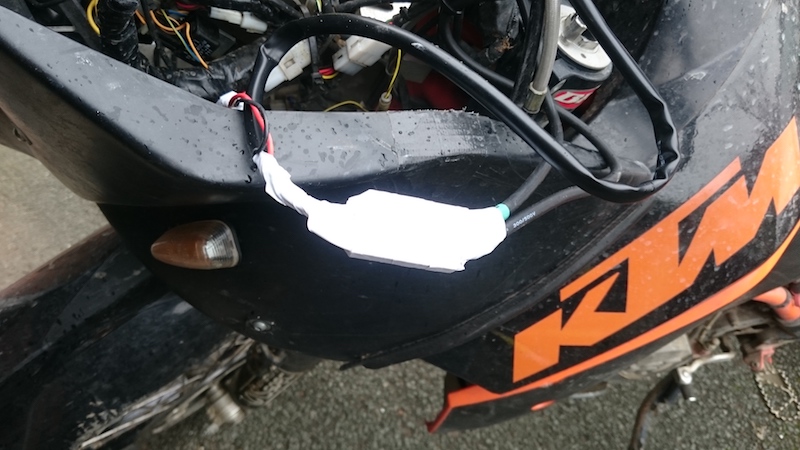 Tidying cables when fitting heated grips