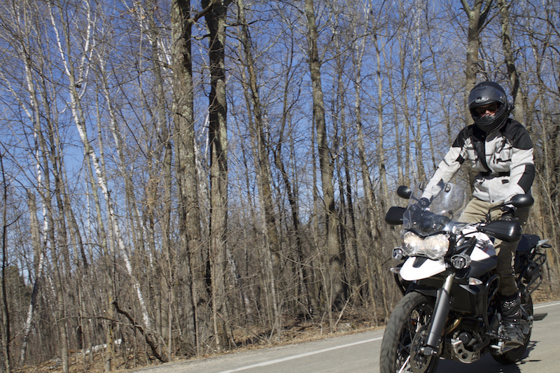 Riding along a tree lined road