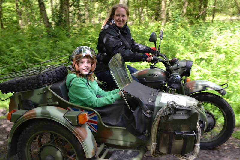 Melanie and Sofia Cowpland riding the side car