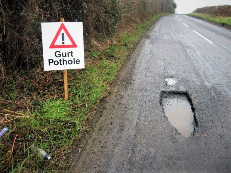 Pothole on road surface
