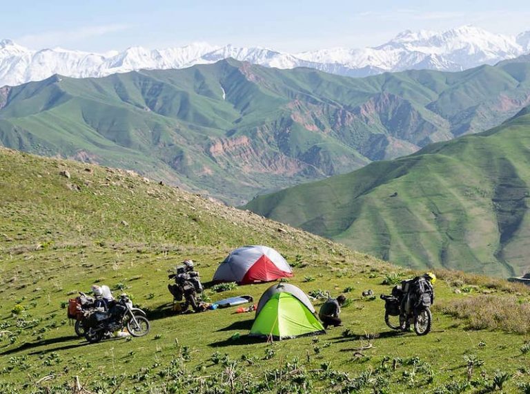 Motorcyclists camping Pamir Mountains