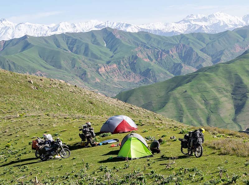 Motorcyclists camping Pamir Mountains