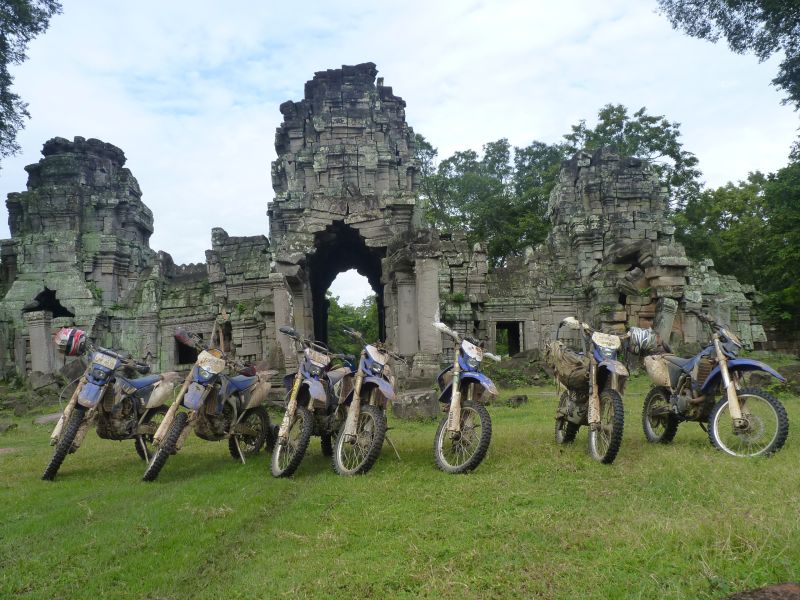 dancing roads cambodia ancient temple ruins motorbikes