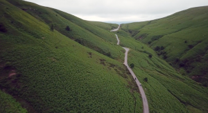 Two motorcyclists following Offas Dyke along Gospel Pass