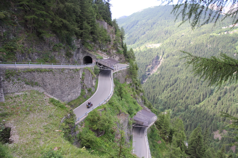 A motorcyclist on the splugen pass in Italy