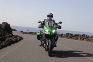 Green Kawasaki Versys 1000 SE on a road in Lanzarote