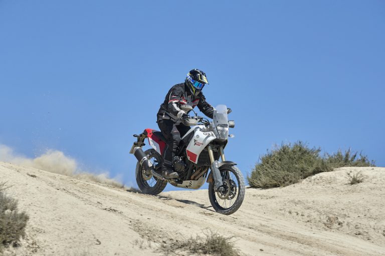 Red and White Yamaha Tenere 700 on a dirt trail in spain