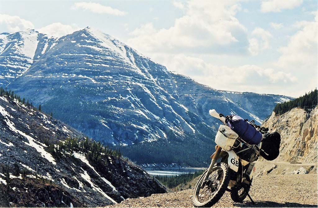 https://www.adventurebikerider.com/wp-content/uploads/2021/02/pan-american-highway-02-Canada-Rocky-Mnts-bike.jpg