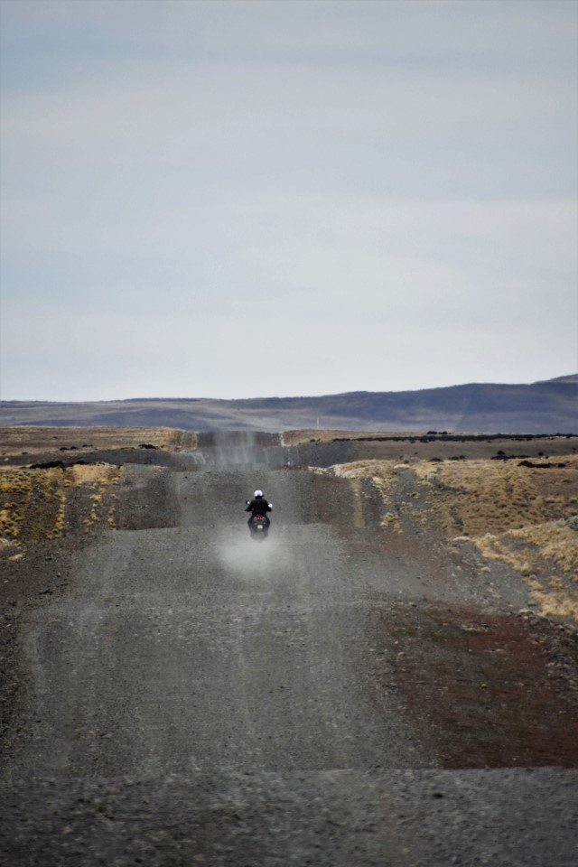 Patrick and Yamaha being pounded. Ruta 40 north of Tapi Aike