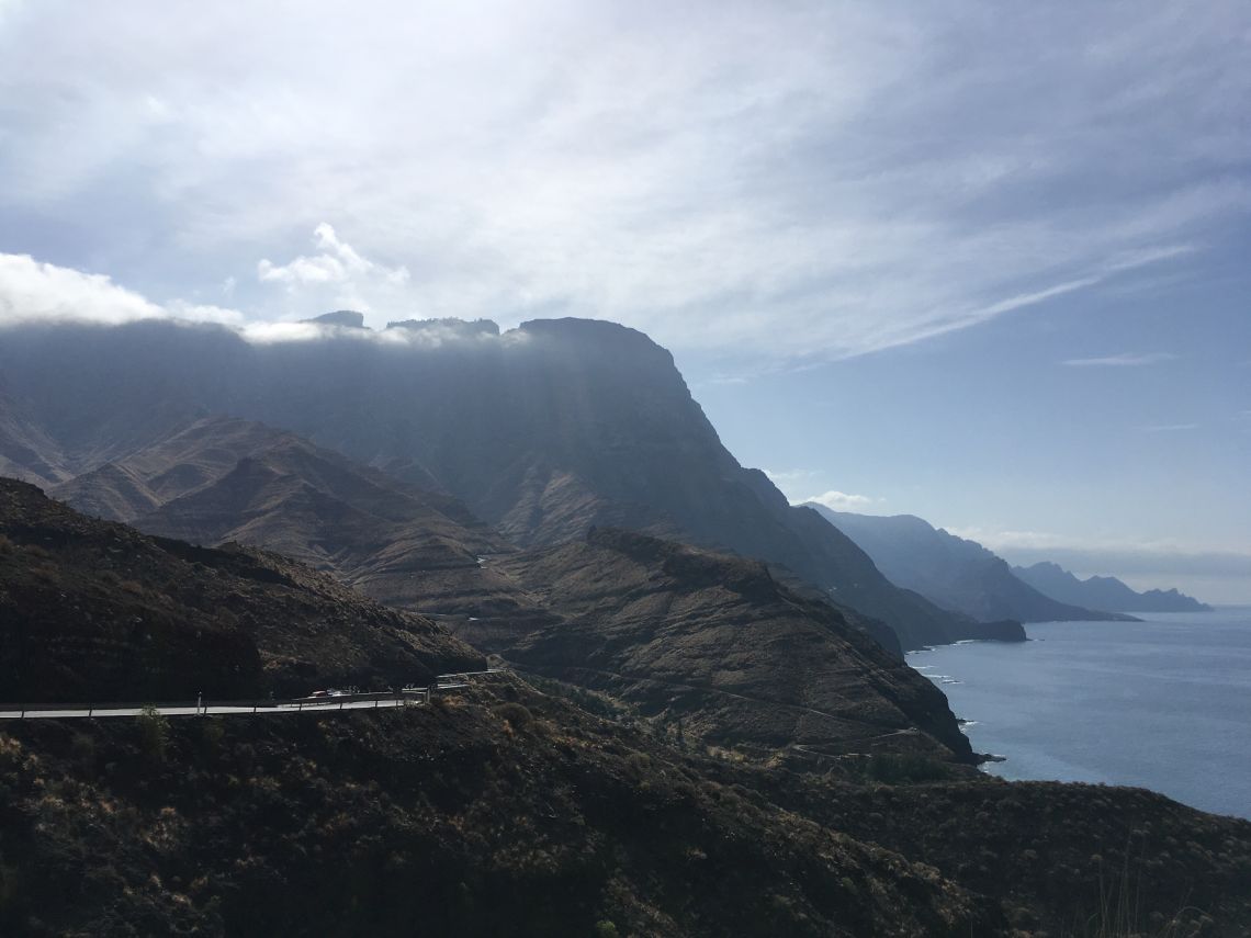 Roads cling to the cliffside