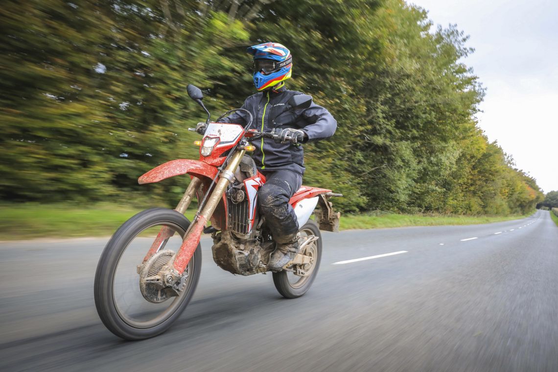 The CRF450 makes short work of the tarmac between trails