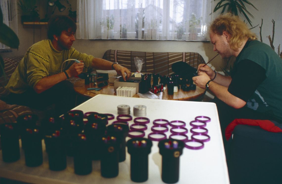 The infamous coffee table in 1992 where another Touratech product the chala lamp is being assembled