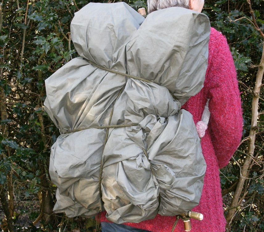 4 Roycraft packframe load wrapped in a groundsheet messy