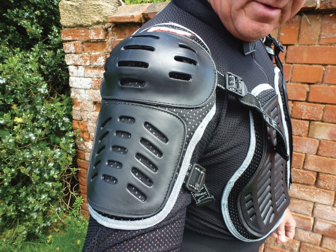 shoulder pad with adjustment straps