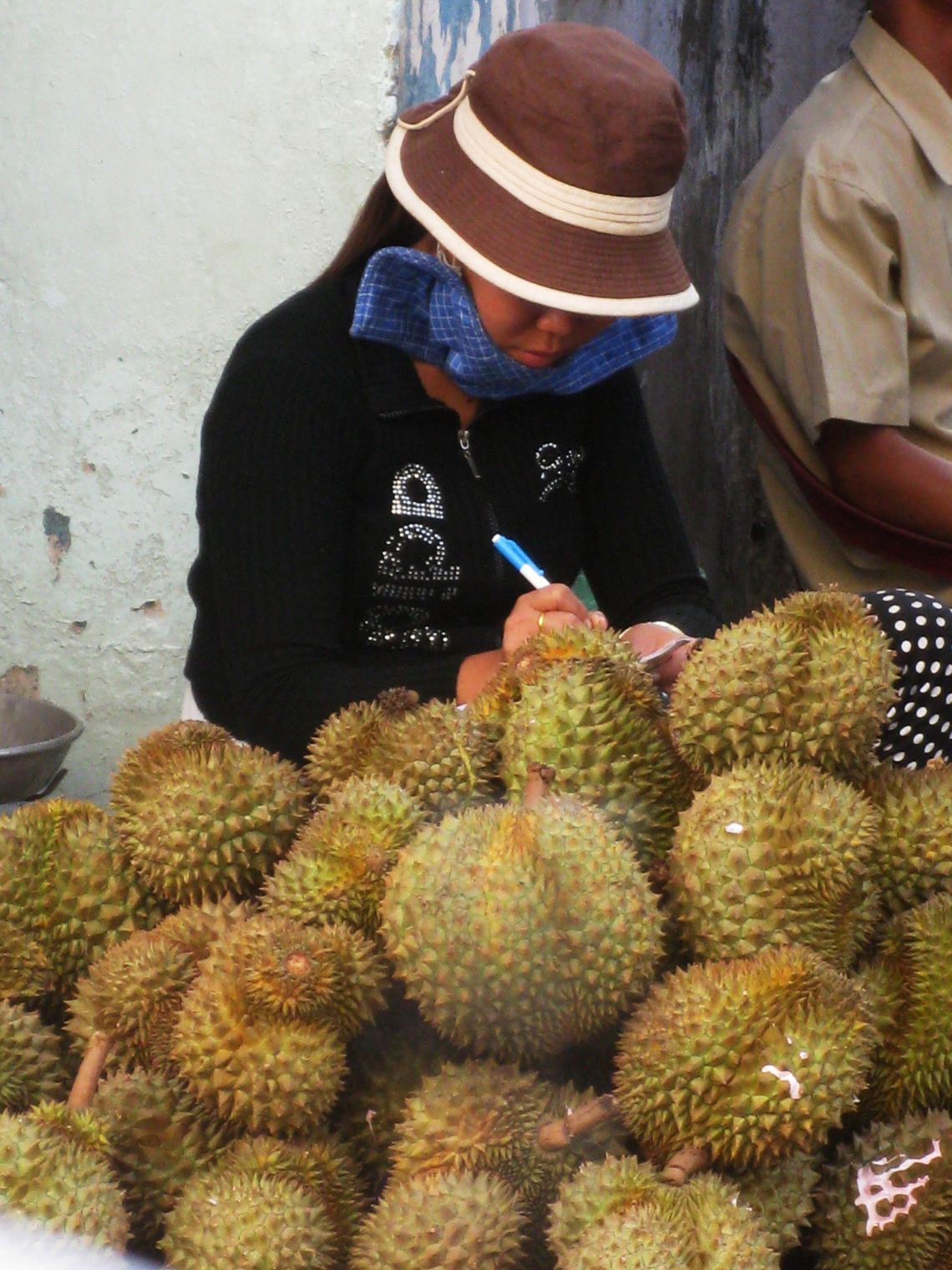 Budget-biking-Durian-seller