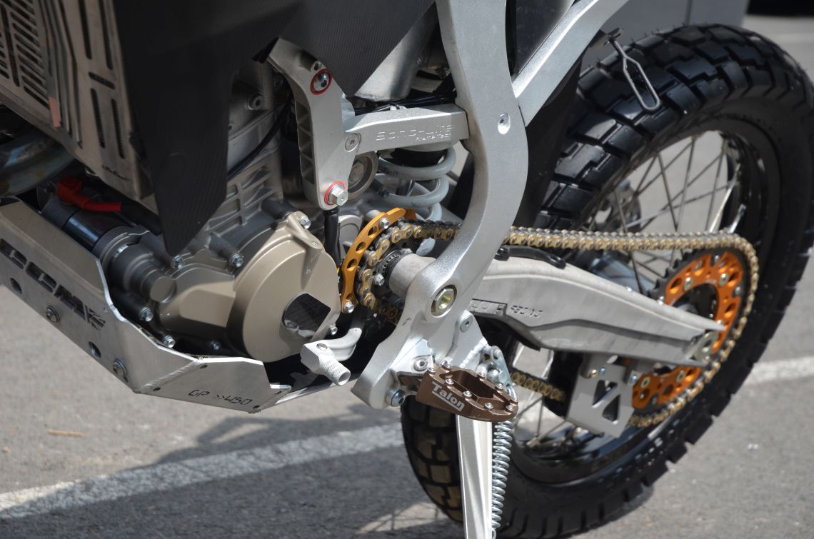 Front sprocket mounted on swingarm pivot